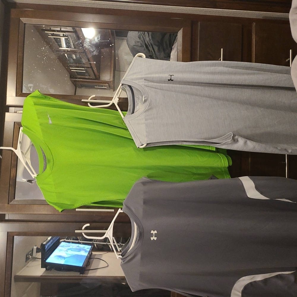 2 Under Armour Tanks l, 1 Nike 3/$15